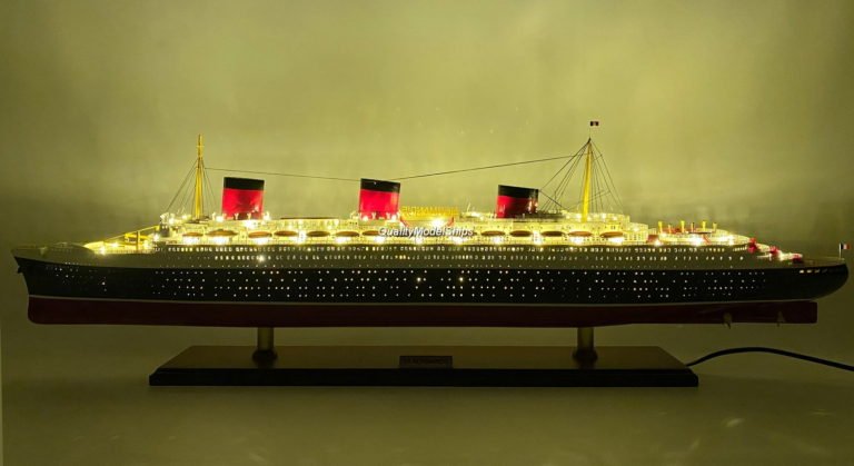 SS Normandie with lights