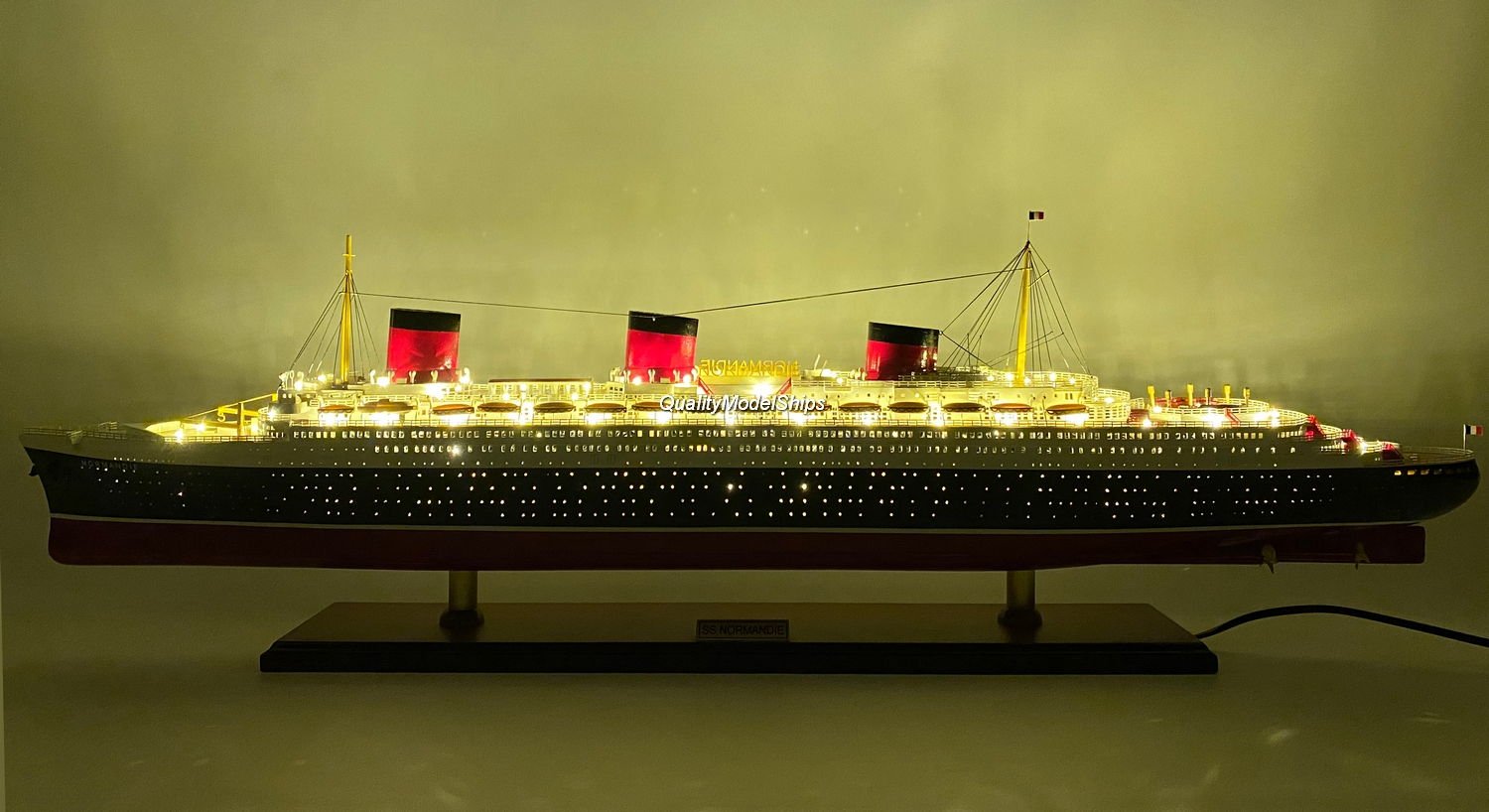 SS Normandie with lights
